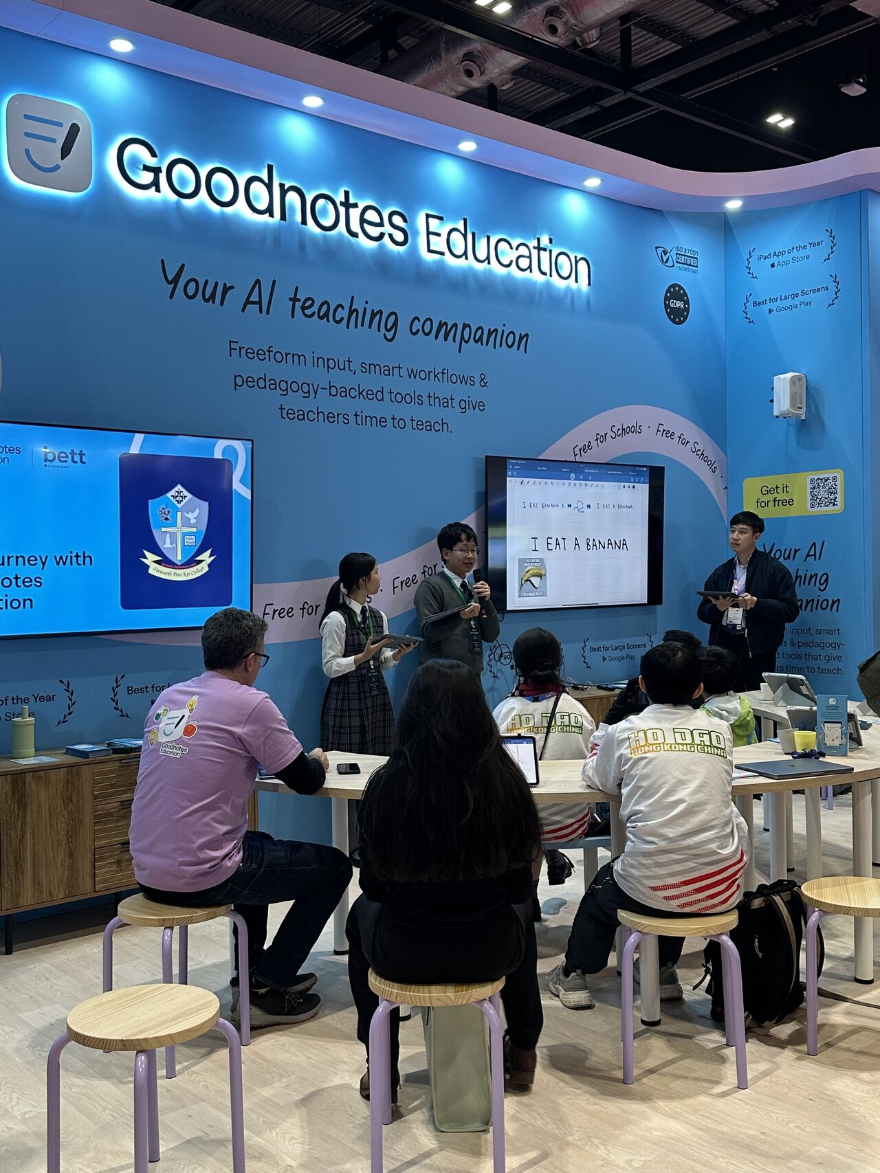 Students presenting from the Goodnotes Education stand