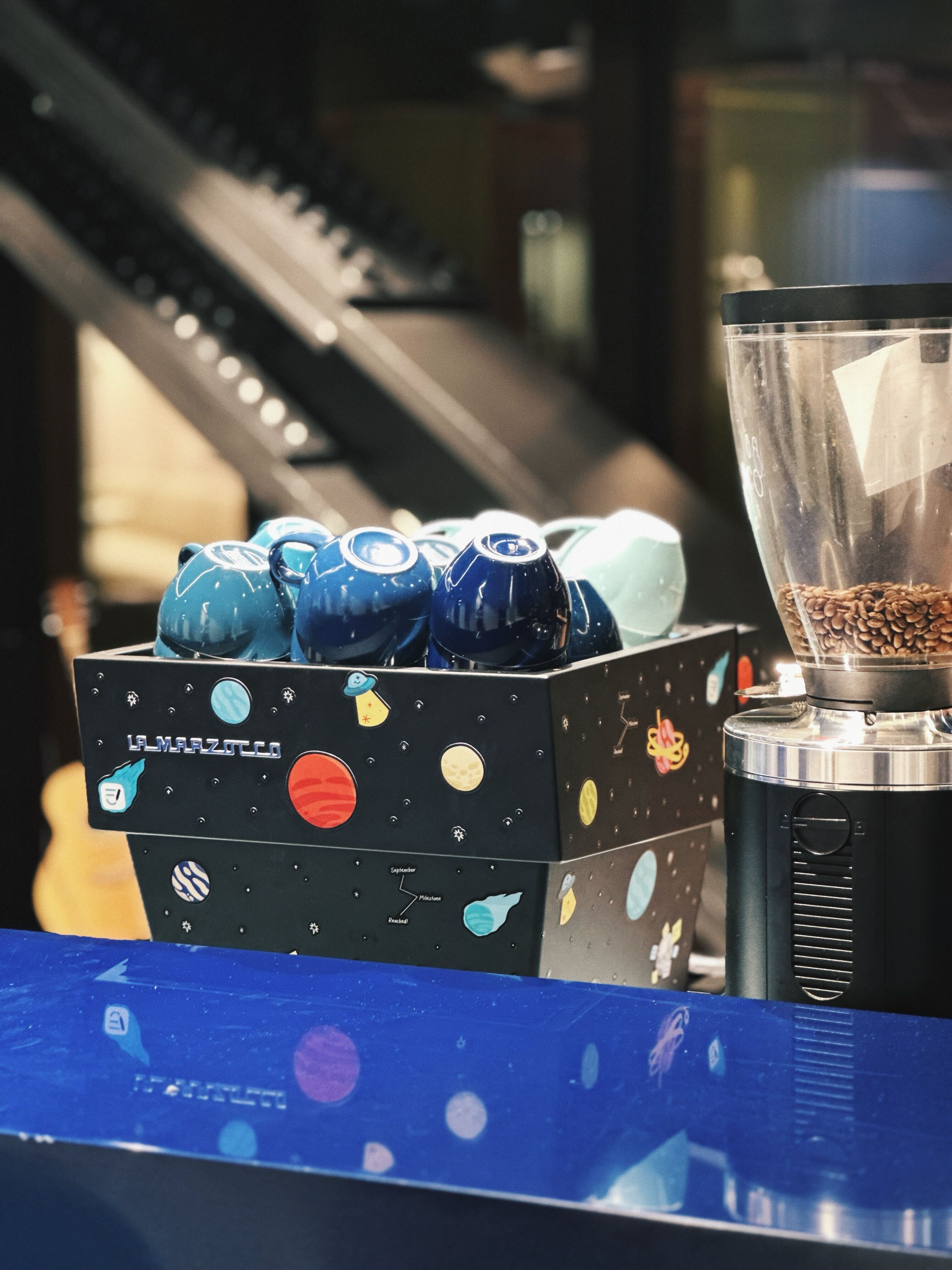 Close-up of the stickered coffee machine