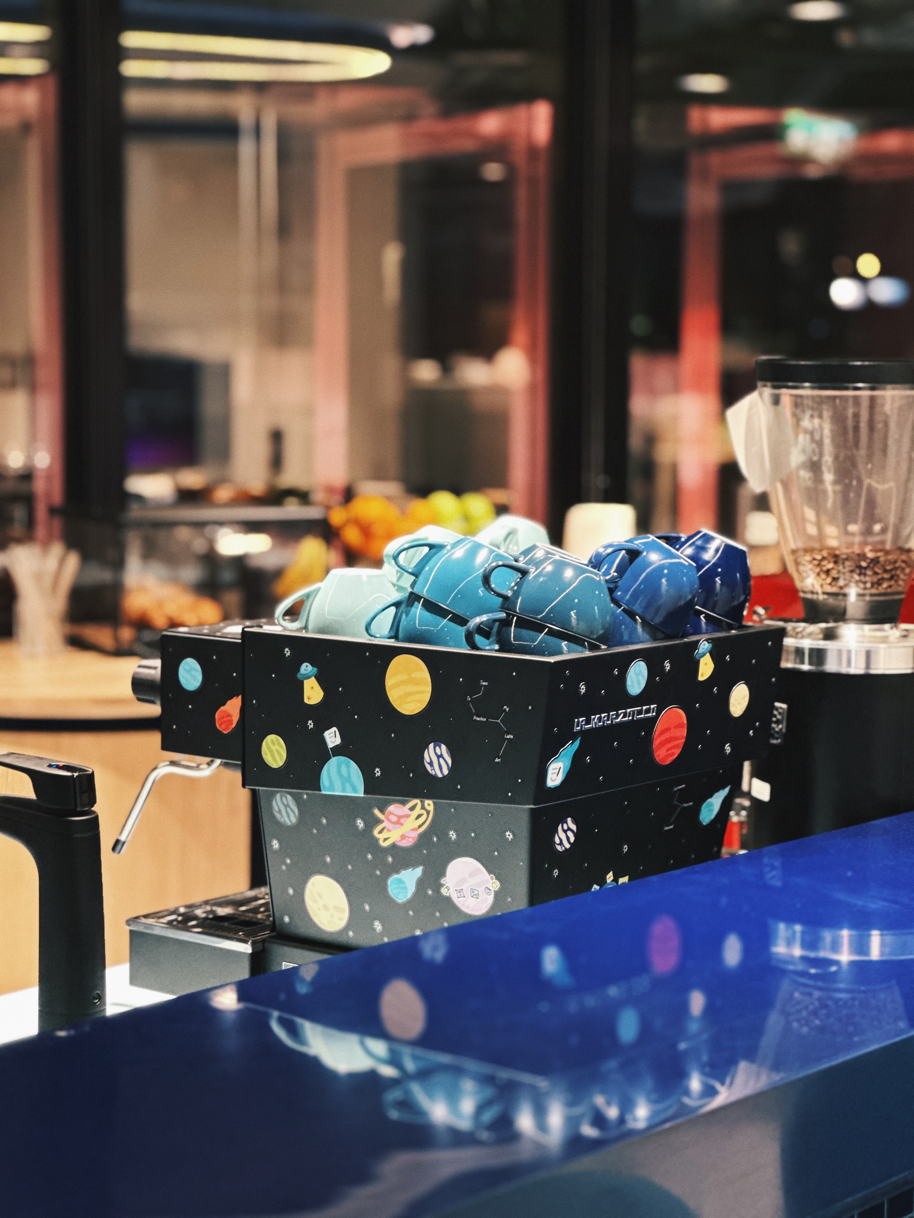 The office coffee machine covered in launch stickers