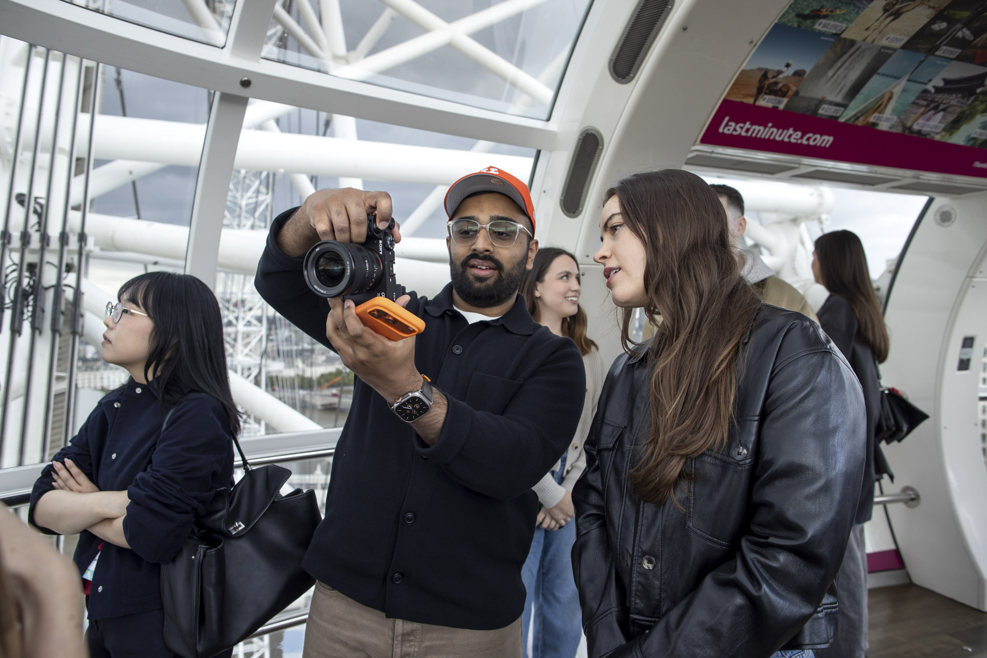Creators filming in a London Eye capsule