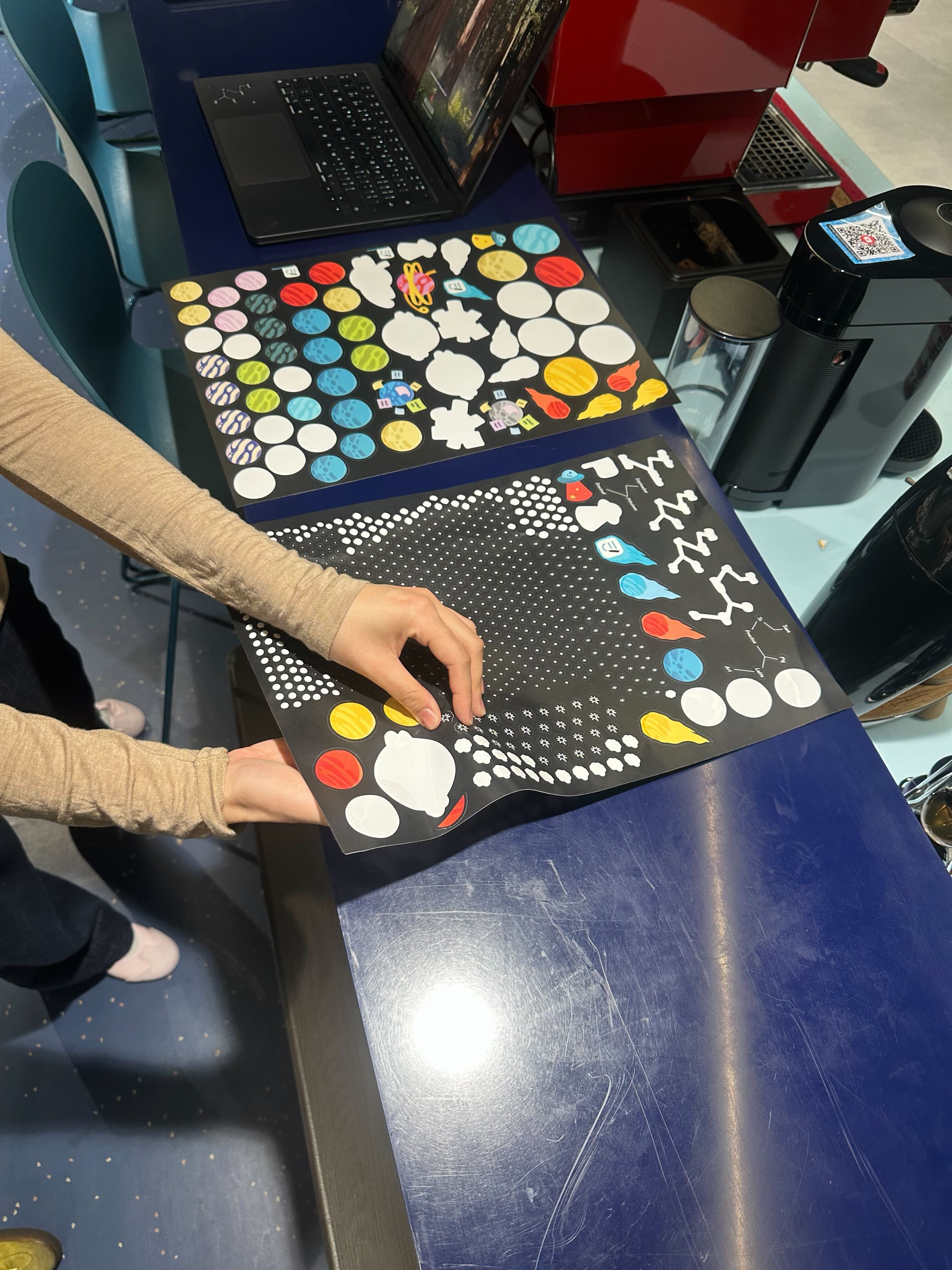 Sticker sheets of planets, comets and constellations from the Outernet film