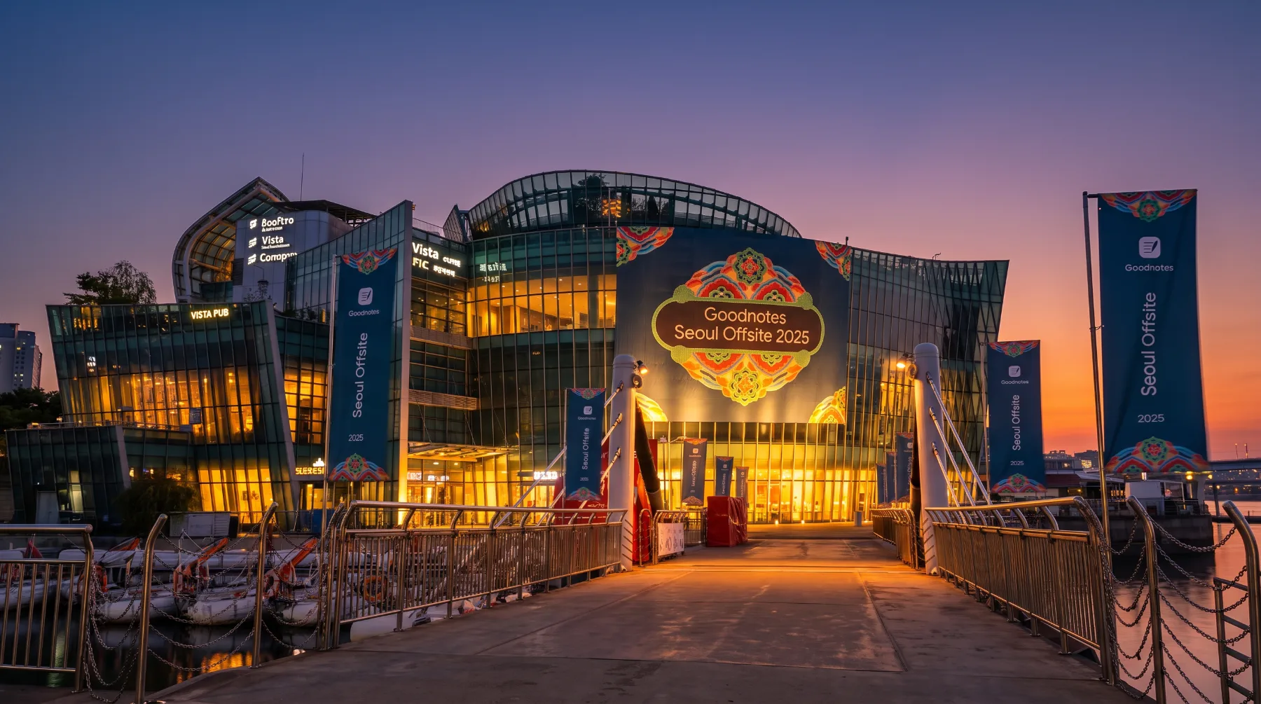 Concept render of the Floating Island venue at dusk with the Dancheong banner and flags lining the bridge