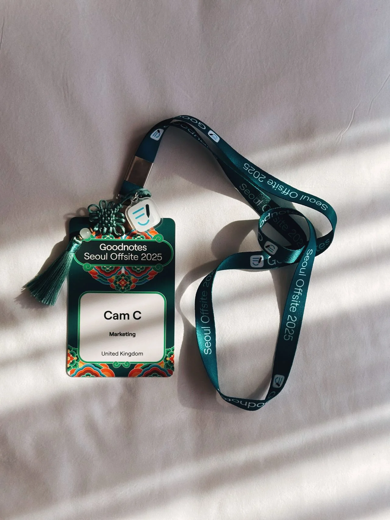 Goodnotes Seoul Offsite 2025 name tag with a maedeup knot on its lanyard
